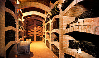 Underground wine cellar full of bottles